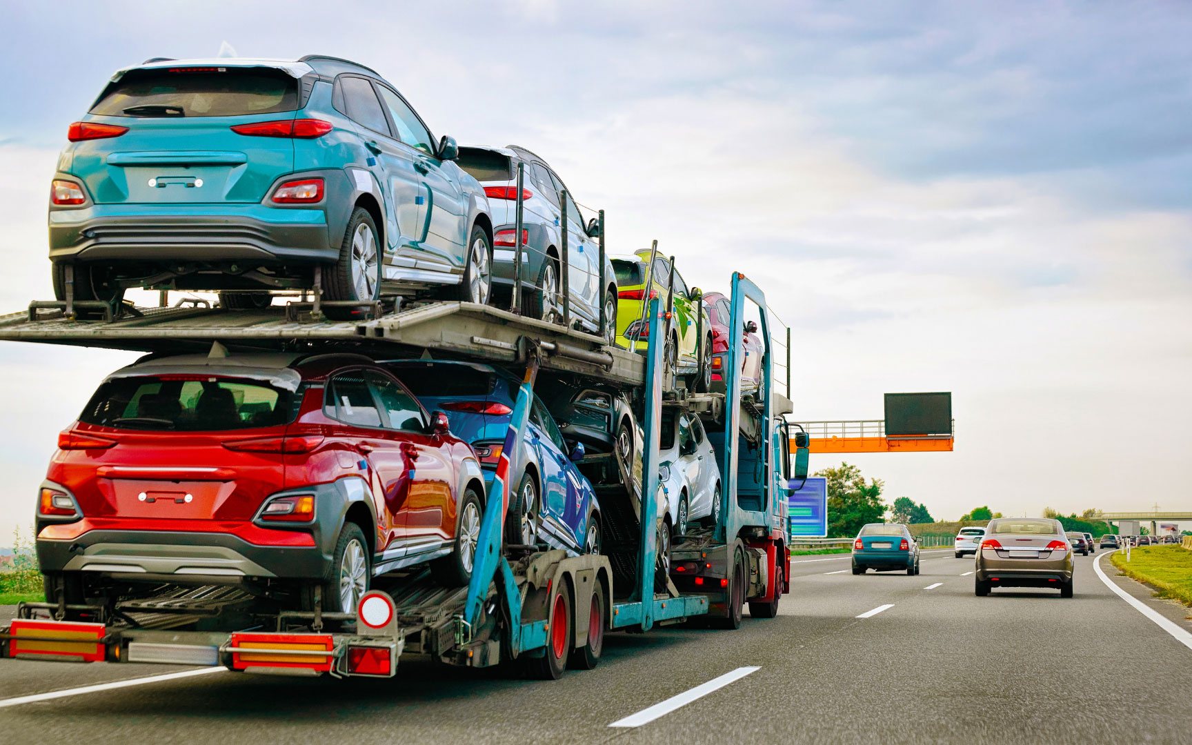 Vehicle transport carrier on highway